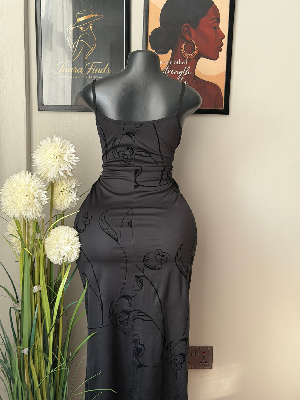 Black seeveless slip-style midi